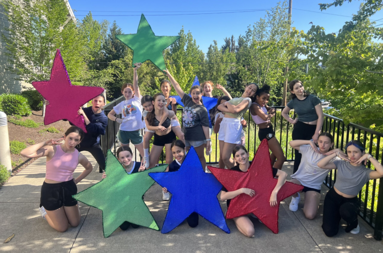 Teens Holding Stars